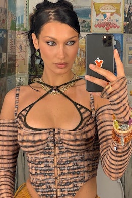 How to wear the Y2K-style zigzag hair part like Bella Hadid.