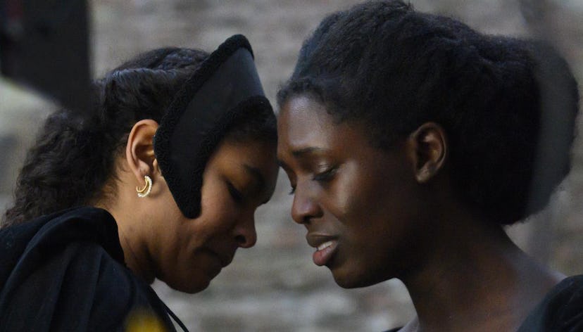 Madge Shelton (played by Thalissa Teixeira) and Anne Boleyn (played by Jodie Turner-Smith)