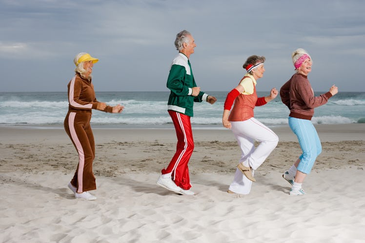 seniors exercising on beach