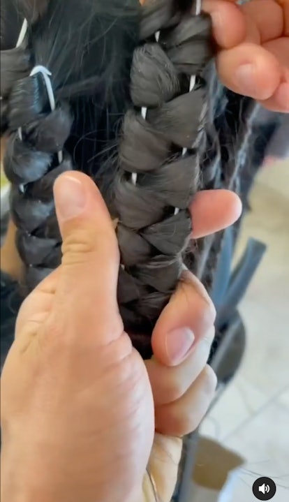 Chris Appleton styles Kim Kardashian's crimped hair with a hanger