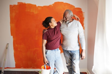 Father-daughter duo happy while painting ahead of Father's Day 2021, in need of Instagram captions.