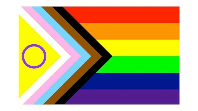 A version of the Progress Pride flag with a symbol for the intersex community.