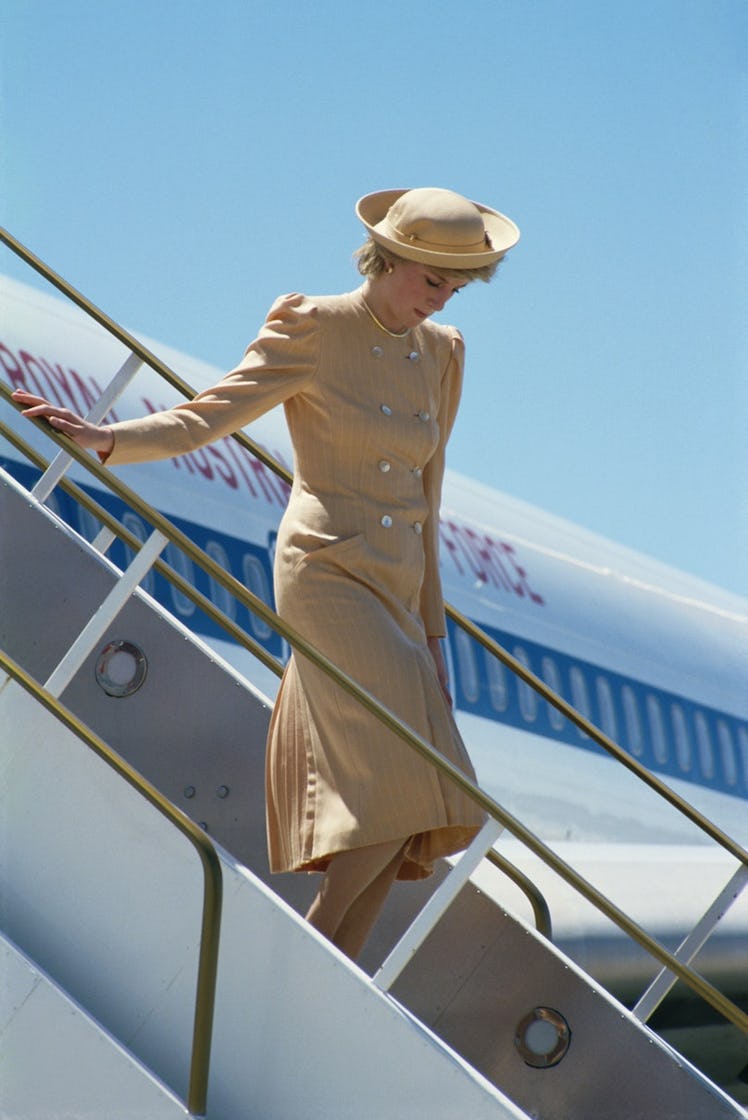 Princess Diana getting off an airplane