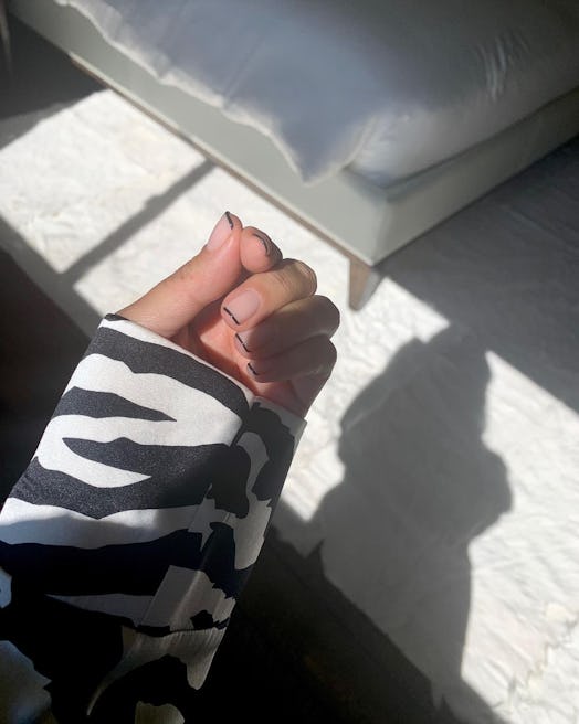 Kourtney Kardashian black nail tips manicure