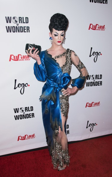 Violet Chachki in pin-up style in a blue satin and silver sequin dress at the Drag Race Season 8 fin...