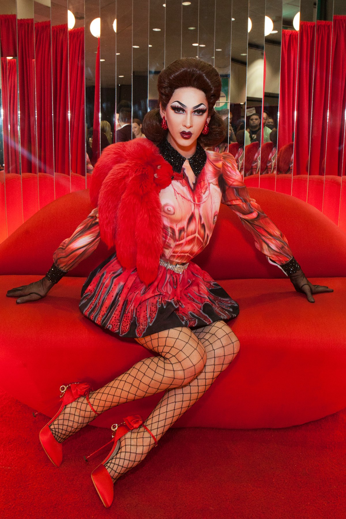 Violet Chachki in booth. 