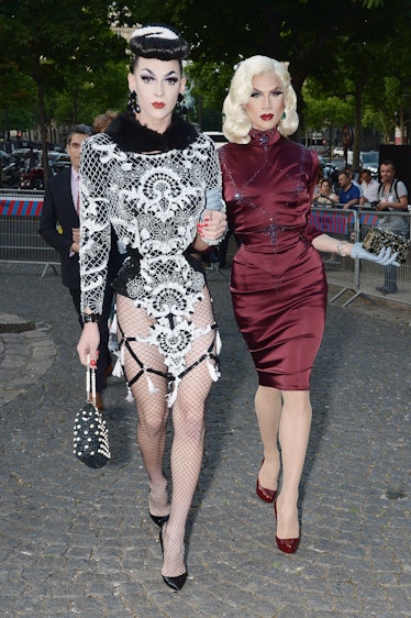 Violet Chachki in pin-up style in a white-black lace dress at a Miu Miu event