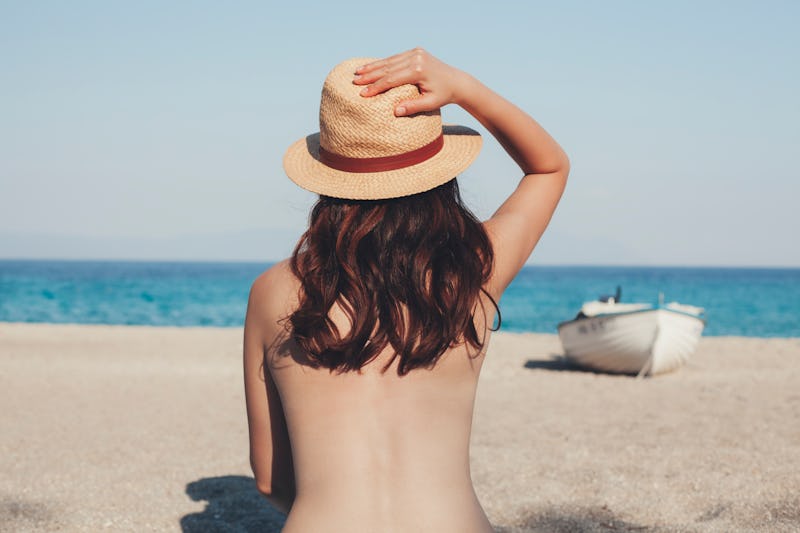 Woman sitting on the beach