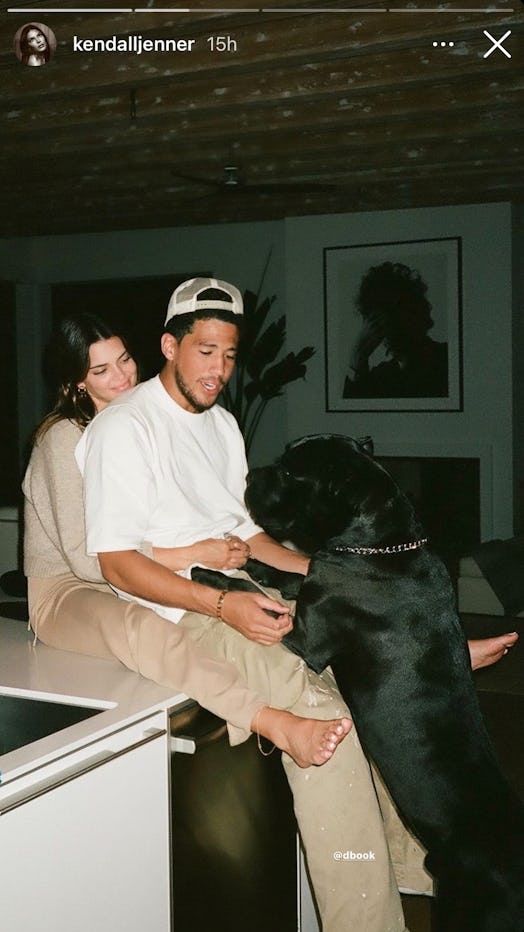 Kendall Jenner cuddles boyfriend Devin Booker.