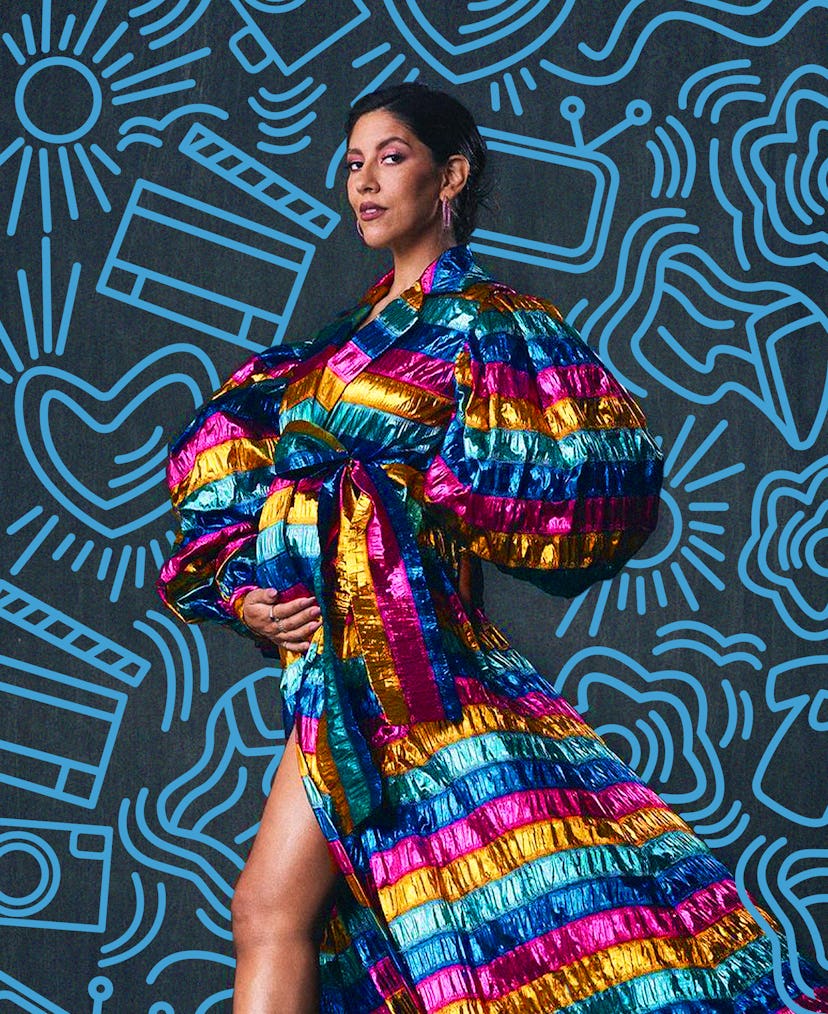 Stephanie Beatriz in a rainbow colored dress
