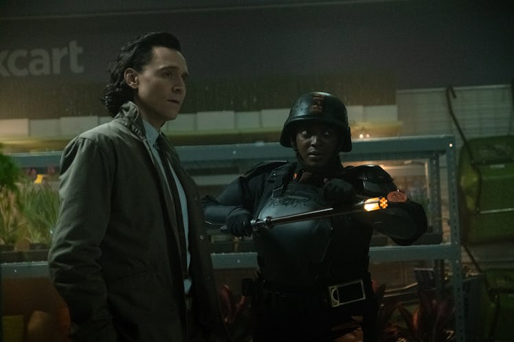 Tom Hiddleston and Wunmi Mosaku in Roxxcart store in Loki Episode 2