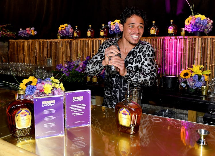 Anthony Ramos shaking up a Crown Royal cocktail