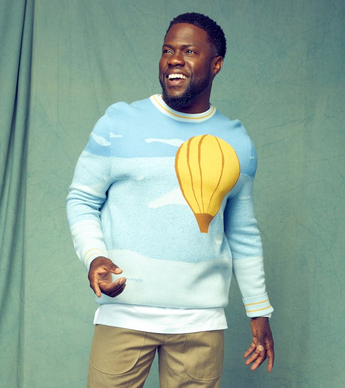 actor Kevin Hart wearing a graphic Victor Li sweater with hot air balloon print