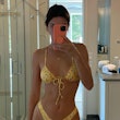 Kendall Jenner wears the Knock Three Times bikini from Heavy Manners on Instagram.