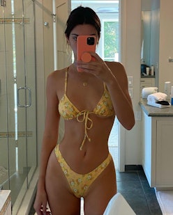 Kendall Jenner wears the Knock Three Times bikini from Heavy Manners on Instagram.