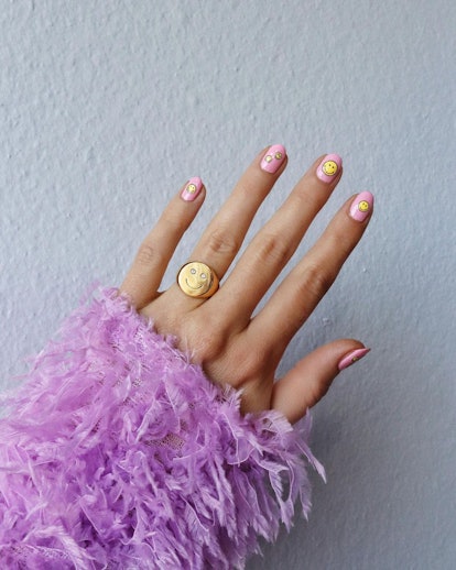 Smiley face nails are the cutest '90s trend.