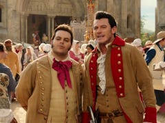 Luke Evans and Josh Gad will reprise their roles as Gaston and LeFou in 'Beauty and the Beast'