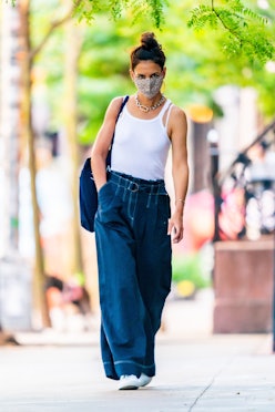 Katie Holmes wearing white tank top and wide-leg jeans in SoHo on July 31, 2020.