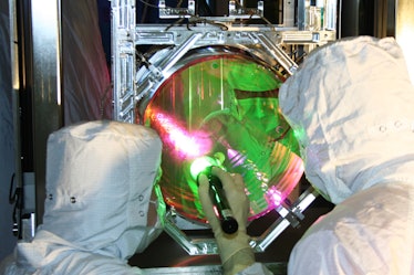 LIGO mirror cooled to near quantum ground state