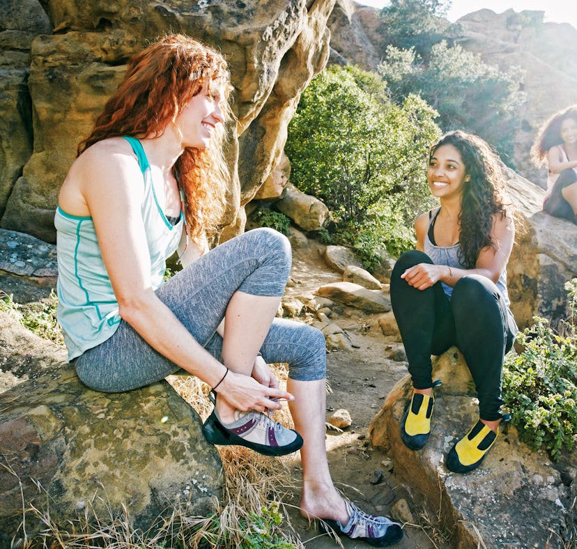 Young women hiking, in need of Instagram captions.