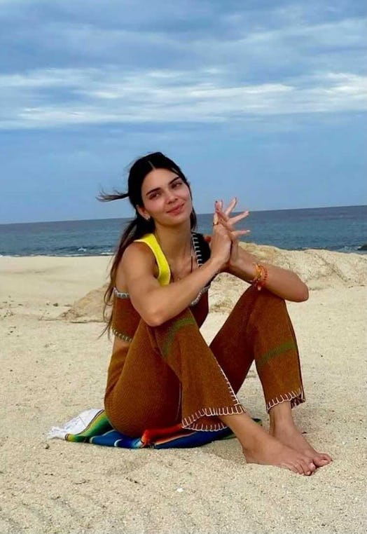 Kendall Jenner posing on a beach