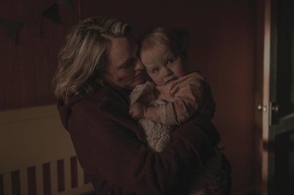 Elisabeth Moss as June hugging her daughter goodbye at the end of The Handmaid's Tale Season 4