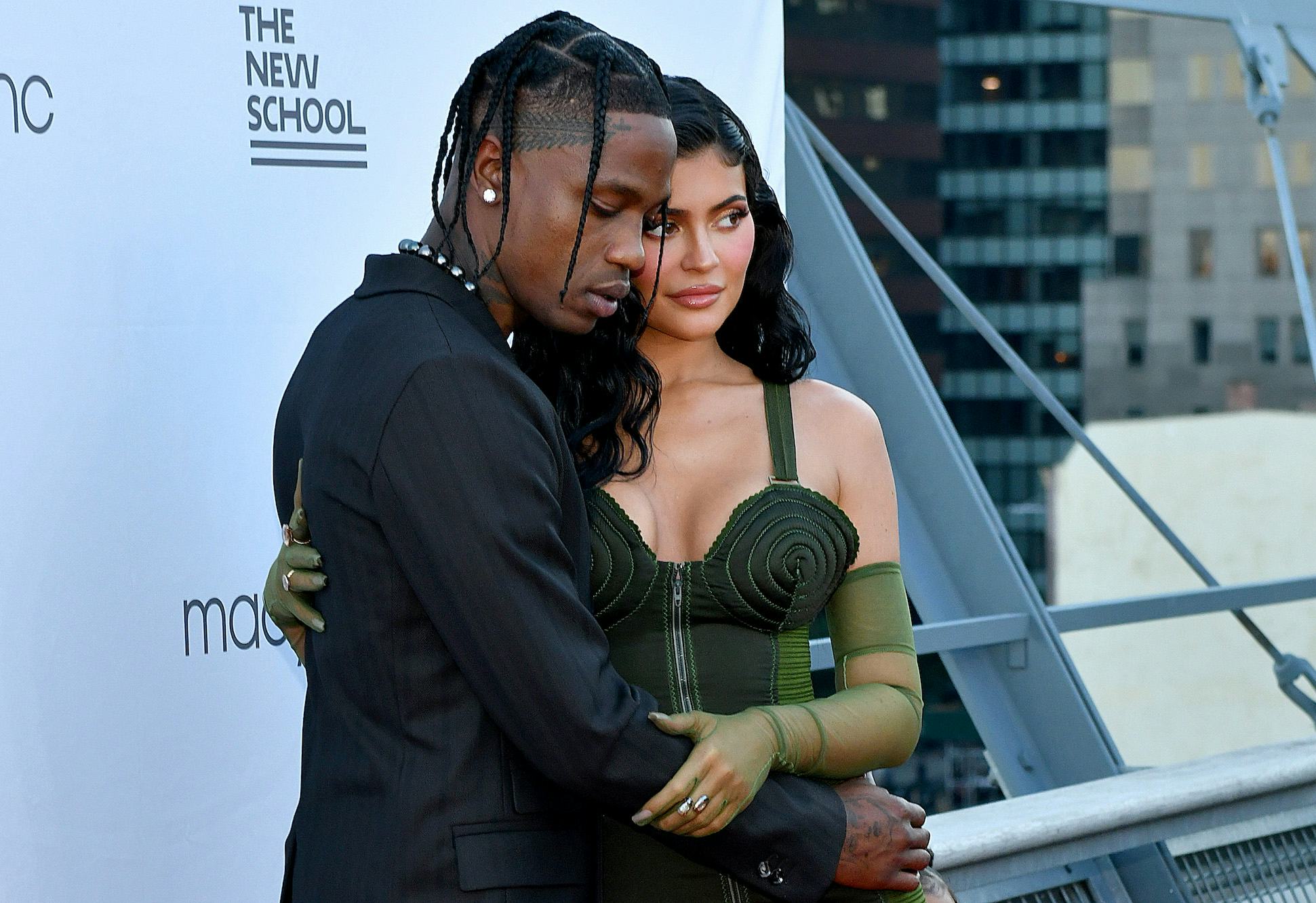 Travis Scott and Kylie Jenner embracing