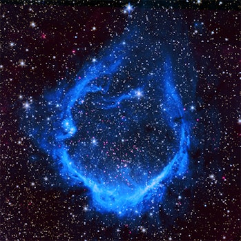 the lagoon nebula seen by spitzer telescope nasa