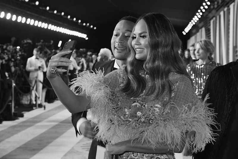 Chrissy Teigen and John Legend attend the 2019 Vanity Fair Oscar Party.