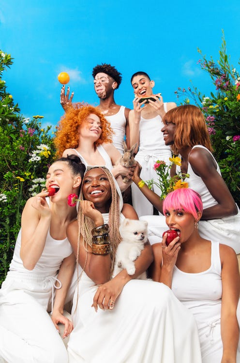 UOMA By Sharon C. models against blue sky