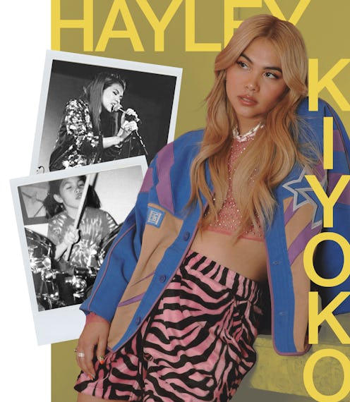Hayley Kiyoko standing next to her childhood photos in a collage
