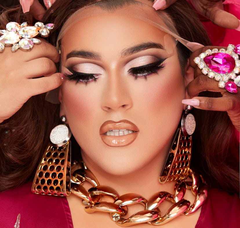 Manny Gutierrez, aka Manny MUA, posing in drag for Lunar Beauty's new Life's A Drag Facelift palette...