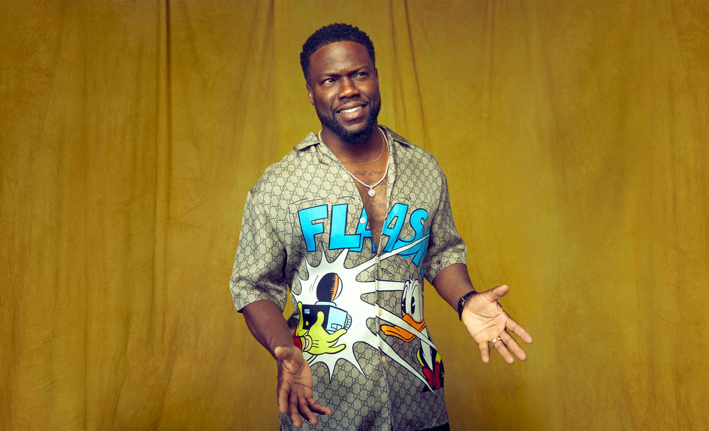 Kevin Hart wearing a donald duck t-shirt 