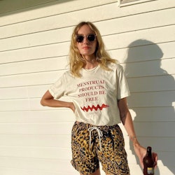 Hannah Baxter wearing leopard swim trunks outfit