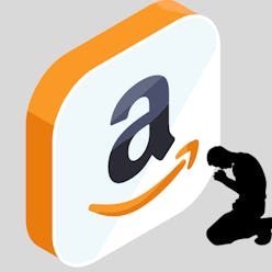 Man kneeling in front of Amazon logo