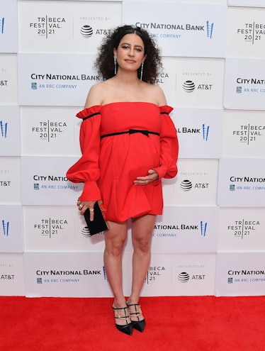 Ilana Glazer in a red dress with ruffles and a black bow at the Tribeca Film Festival 