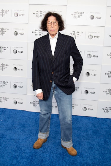 Fran Lebowitz in a striped blazer, white button-up and jeans 