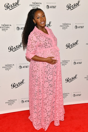 Nana Mensah in a lacey pink gown 