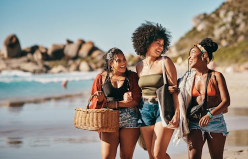 Women at the beach in the sun