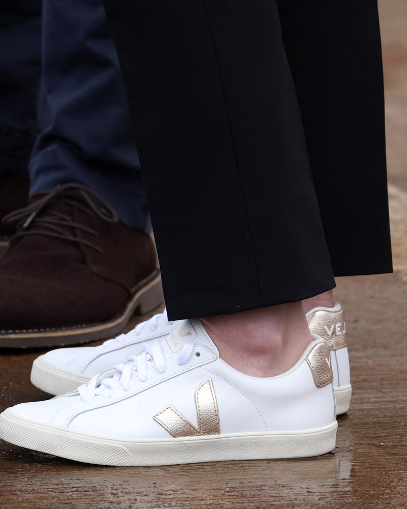 A shoe detail of the Duchess of Cambridge's white Veja sneakers during the meeting with local fisher...