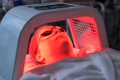 Women receiving red LED light treatment