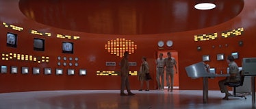 A team of scientists in a red control room in The Andromeda Strain