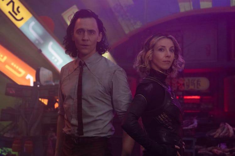 Tom Hiddleston as Loki and Sophia Di Martino as Sylvie in lighting that celebrates their sexuality