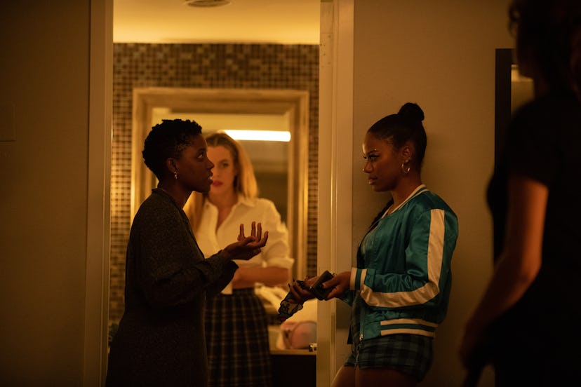 Janicza Bravo (left) on set with Riley Keough and Taylour Paige for Zola. Photo courtesy of A24.
