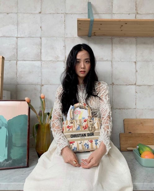 Blackpink's Jisoo carries a Dior bag.