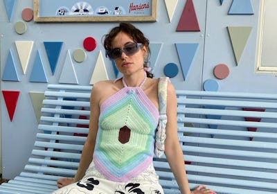 Artist Simone Noa Hedal wears a halter top from House of Sunny.