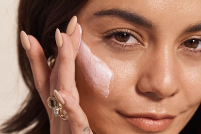 Vanessa Hudgens applying some of her and Madison Beer's Know Beauty moisturizer on.