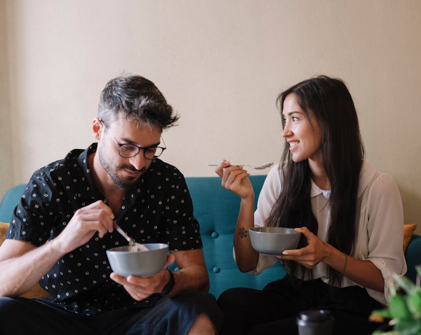 couple eating out of bowls 