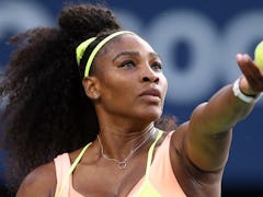 Serena Williams playing tennis, who said she won't be at the 2021 Olympics.