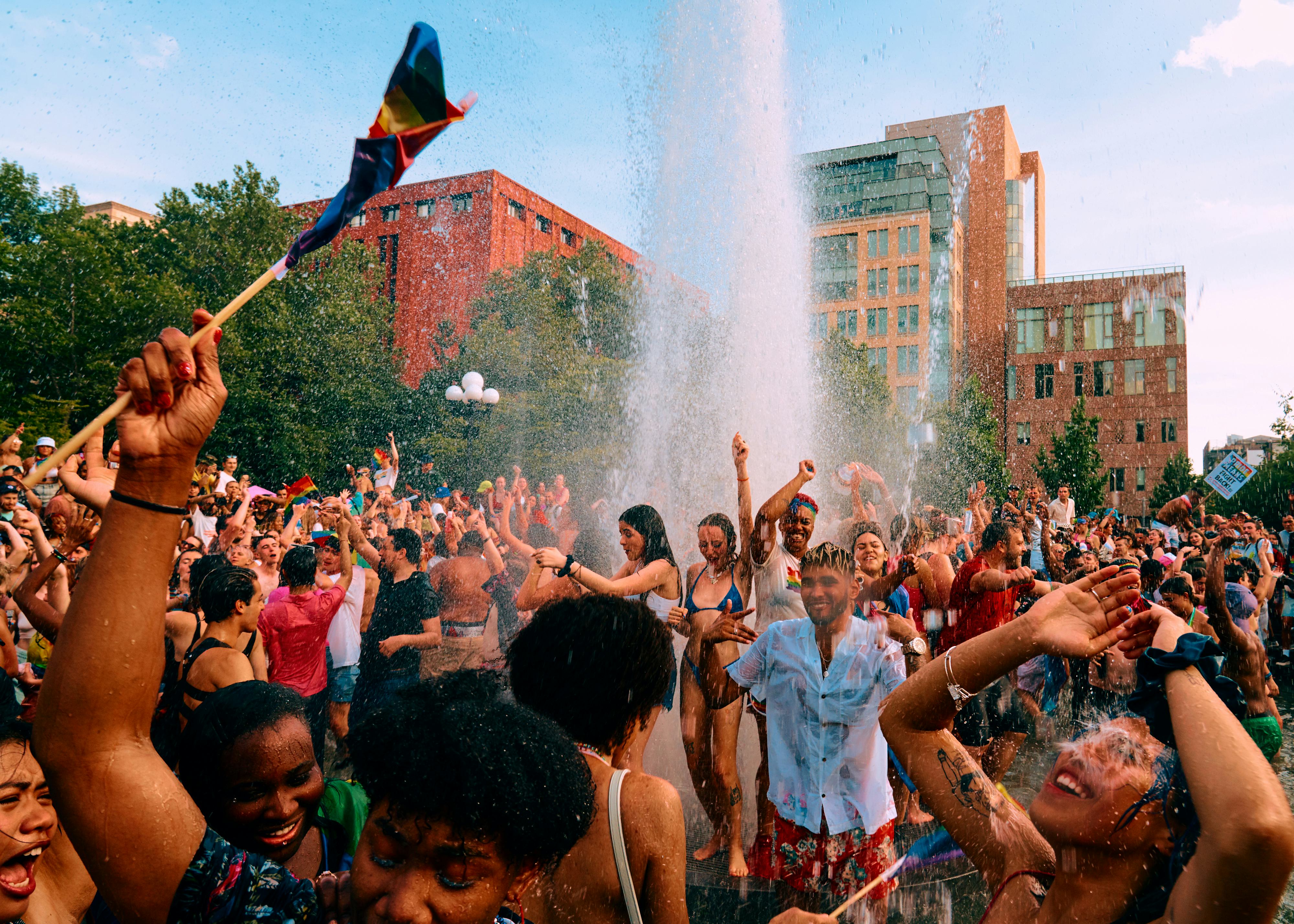A crowd out in the streets of New York honoring the LGBTQIA+ community 